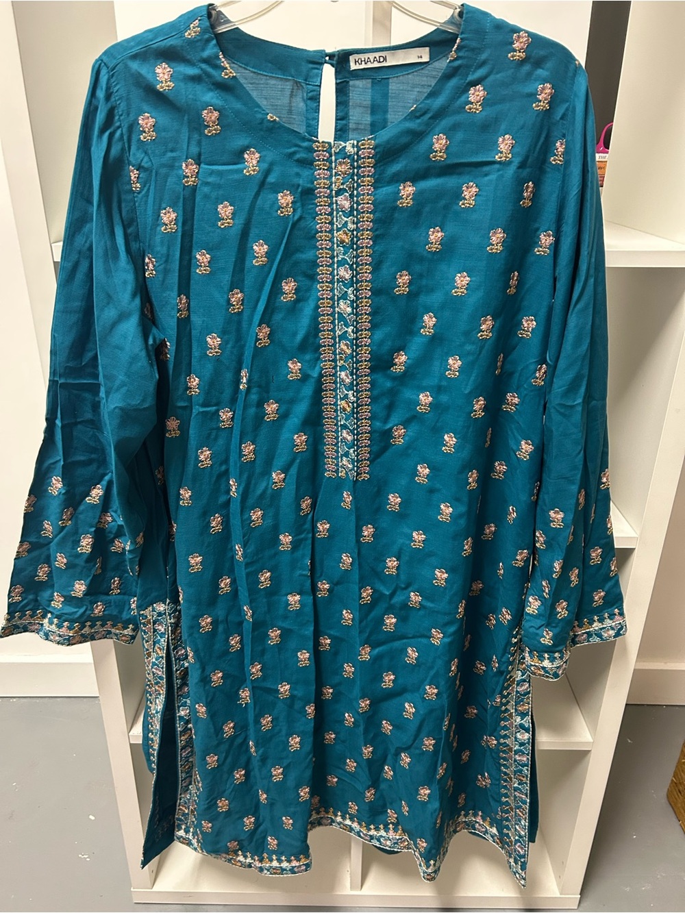 Khaadi Teal Embroidered Women’s Dress includes the pants